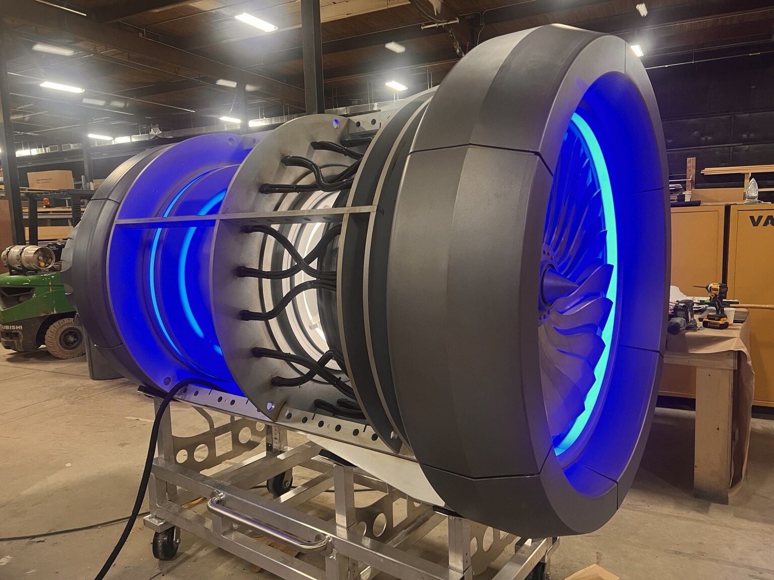 Large turbine set piece illuminated in blue