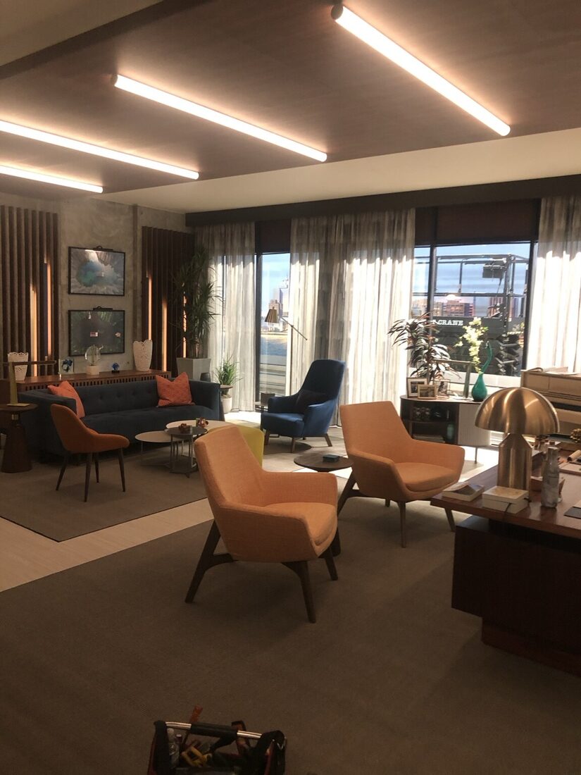 Good Sam lounge set with suspended linear ceiling lighting