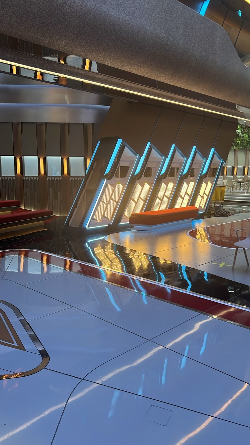 Architectural science-fiction set with blue and amber lighting