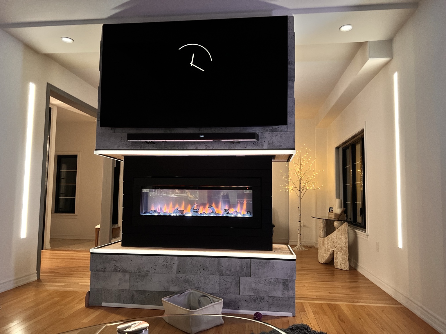Residential fireplace feature with integrated lighting